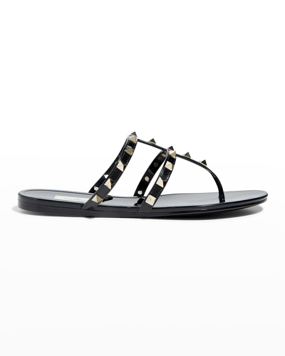 Shop Valentino Rockstud T-strap Flat Slide Sandals In Black