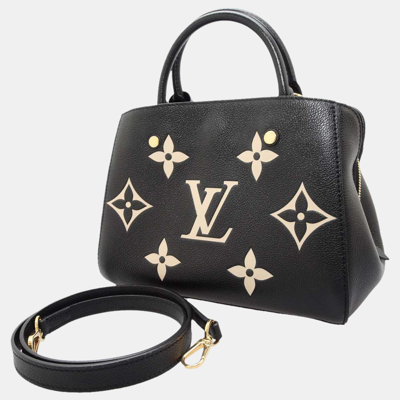 Louis Vuitton Montaigne BB in black empreinte leather now available. Click  to shop.