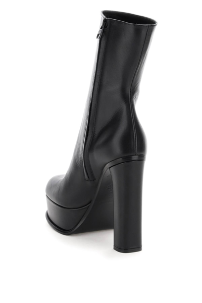 Shop Alexander Mcqueen Leather Platform Ankle Boots In Black