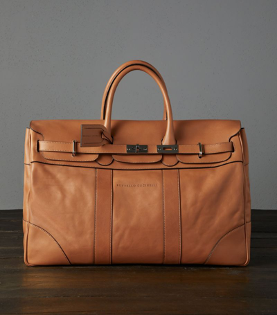 Shop Brunello Cucinelli Leather Embossed-logo Holdall In Brown