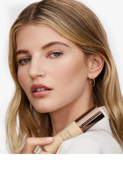 Shop Hourglass Ambient Soft Glow Liquid Foundation In 11