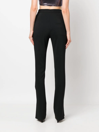 Shop Genny Flared High-waist Trousers In Black