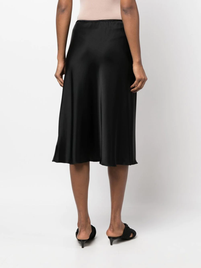 Shop Nanushka Satin-finish Midi-skirt In Black