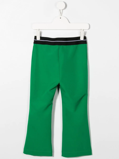 Msgm Logo-waistband Flared Trousers In Green