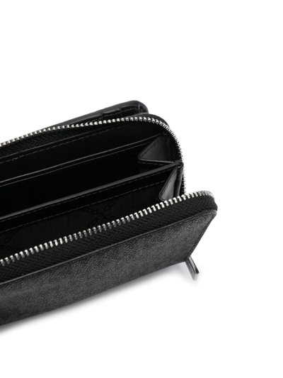 Michael Kors Logo Zipped Wallet In Schwarz