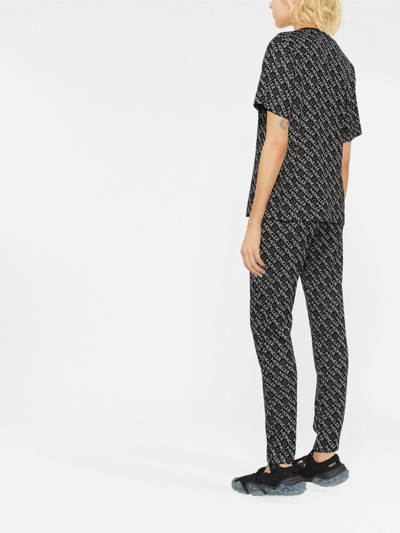 Moncler Logo-print Jersey Trousers In Schwarz