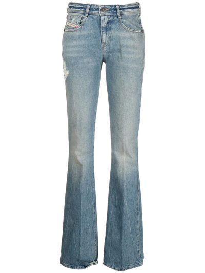 Shop Diesel D-ebbey Faded Bootcut Jeans In Blau