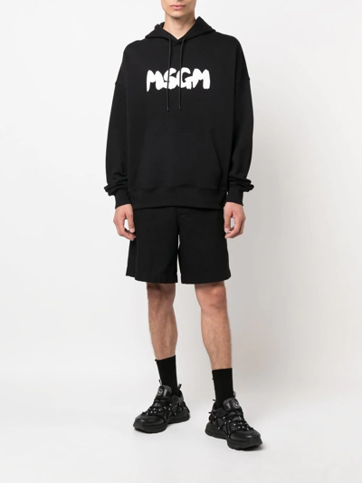 Shop Msgm Logo-print Cotton Hoodie In Black