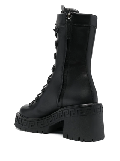 Shop Versace Greca Platform Combat Boots In Schwarz