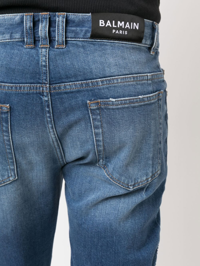 Balmain Light Blue Biker Jeans With Zip And Rips In Blau