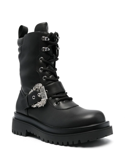 Shop Versace Jeans Couture Drew Baroque-buckle Combat Boots In Schwarz