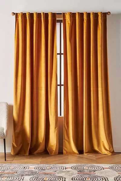 Shop Anthropologie Velvet Louise Curtain By  In Yellow Size 50x63