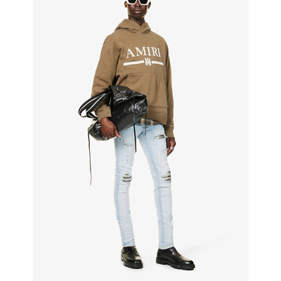 Shop Amiri Mx1 Camouflage-pattern Slim-fit Skinny Stretch-cotton Trousers In Light Indigo