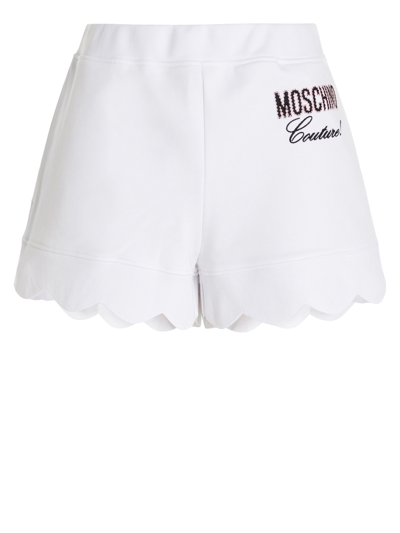 Shop Moschino Scalloped Hemline Shorts In White