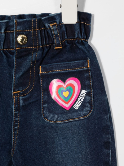 Shop Moschino Logo-print Contract-stitching Jeans In Blue