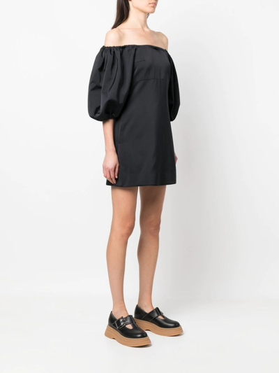 Shop Patou Off-shoulder Puff Sleeve Mini Dress In Black