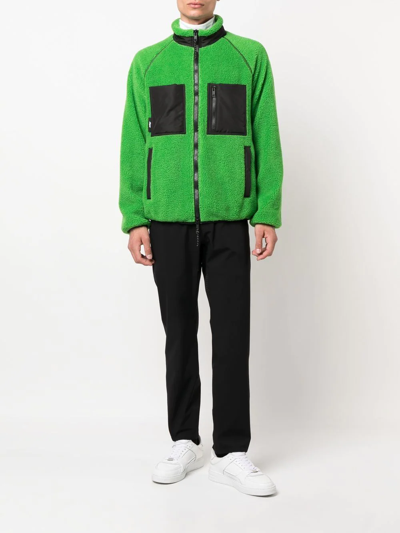 Shop Msgm Logo-patch Funnel Neck Jacket In Green