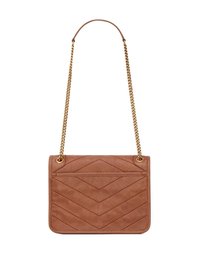 Shop Saint Laurent Niki Quilted Crossbody Bag In Brown