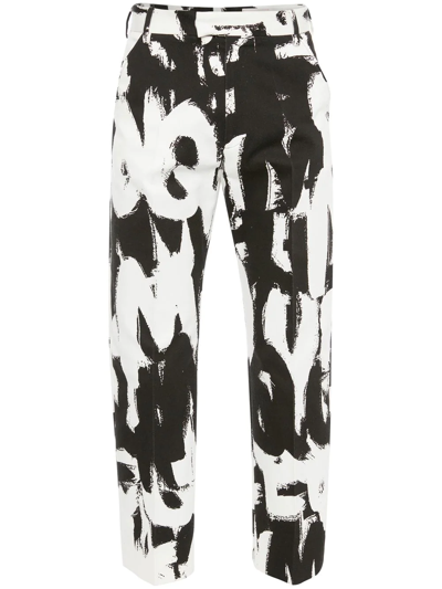 Shop Alexander Mcqueen Organic Cotton Graffiti Trousers In Black