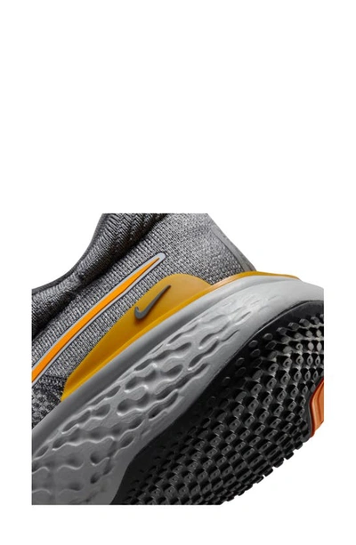 Shop Nike Zoomx Invincible Run Flyknit Running Shoe In Iron Grey/ Kumquat/ Grey