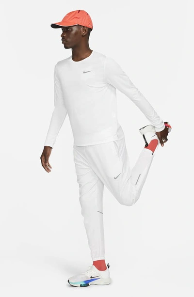 Shop Nike Dri-fit Miler Long Sleeve Running Shirt In White