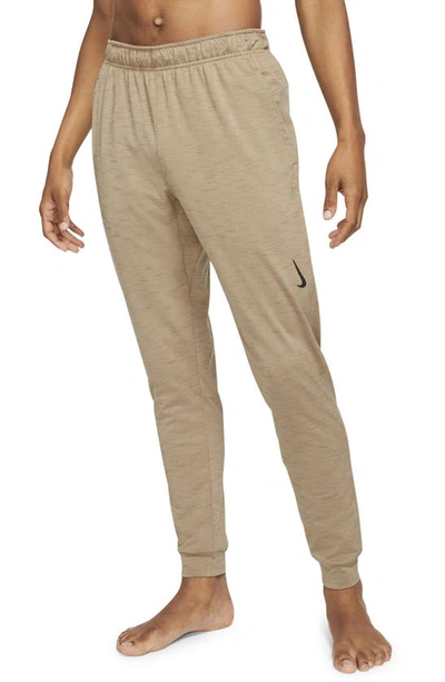 Shop Nike Pocket Yoga Pants In Khaki/ Brown Kelp