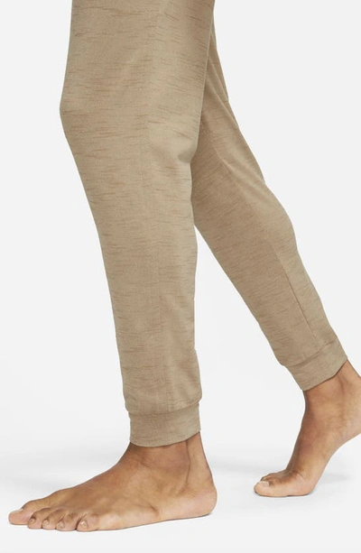 Shop Nike Pocket Yoga Pants In Khaki/ Brown Kelp