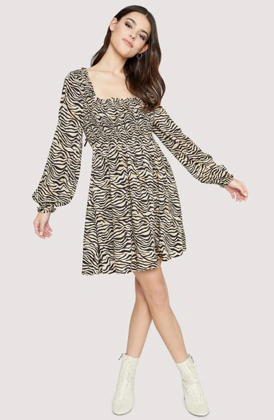 Shop Lost + Wander Can't Be Tamed Smocked Long Sleeve Minidress In Black Gold Zebra