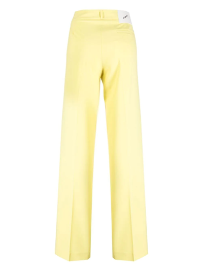 Shop Coperni Pressed Twill Trousers In Yellow