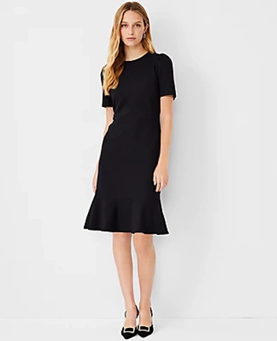 Shop Ann Taylor Petite Puff Sleeve Flounce Sheath Dress In Black