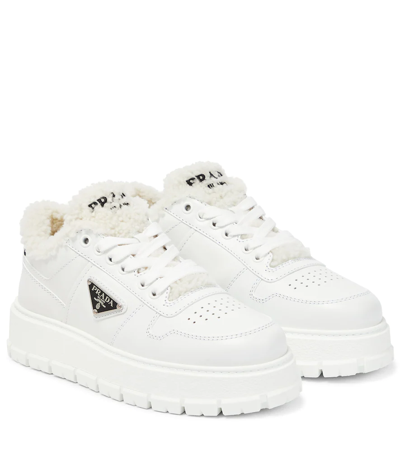 Prada Leather Shearling Lug-sole Sneakers In Bianco
