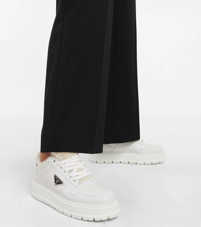 Prada Leather Shearling Lug-sole Sneakers In Bianco