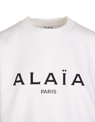 Alaïa Woman White Crew Neck Sweatshirt With Logo | ModeSens