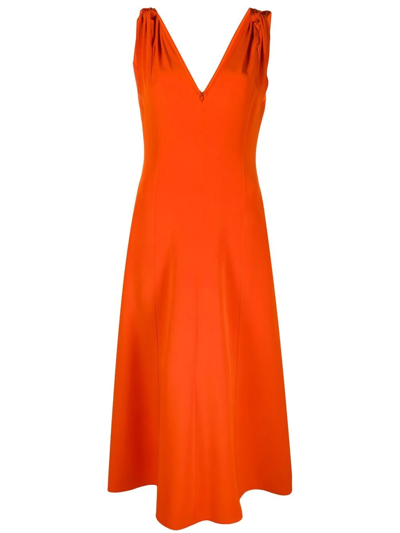 Shop Victoria Beckham Twist-shoulder Fit-and-flare Dress In Orange