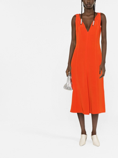 Shop Victoria Beckham Twist-shoulder Fit-and-flare Dress In Orange