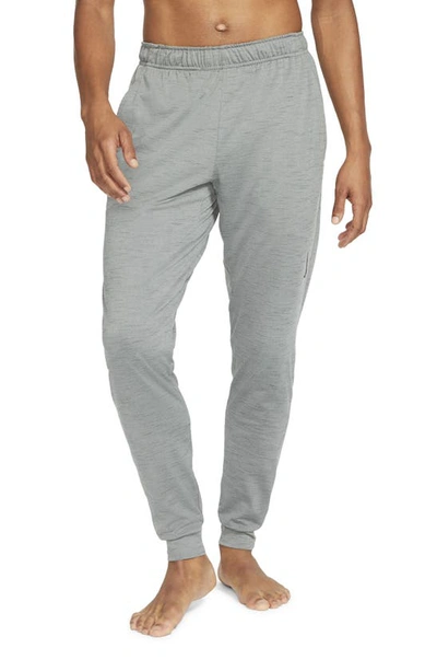 Shop Nike Pocket Yoga Pants In Smoke Grey/ Iron Grey/ Black