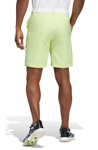 Shop Adidas Golf Ultimate365 Core Water Repellent Performance Golf Shorts In Pulse Lime