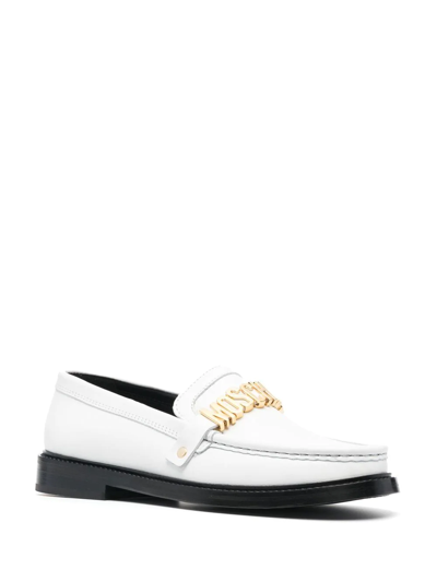 Shop Moschino Logo-plaque Round Toe Loafers In White