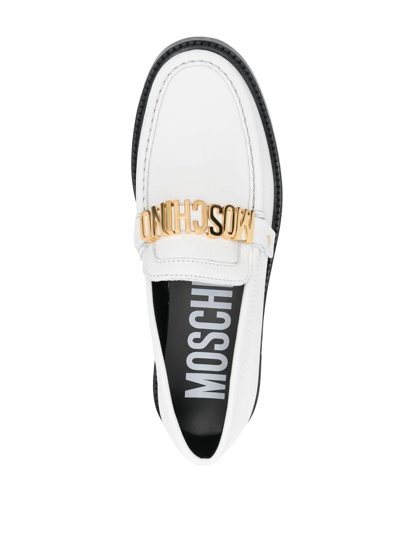 Shop Moschino Logo-plaque Round Toe Loafers In White