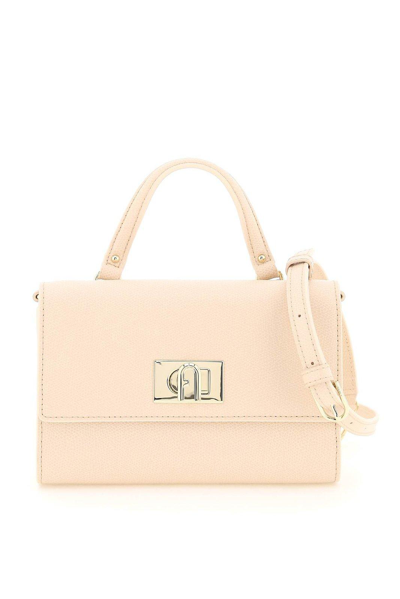 Shop Furla 1927 Foldover Top Handle Bag In Blush Pink