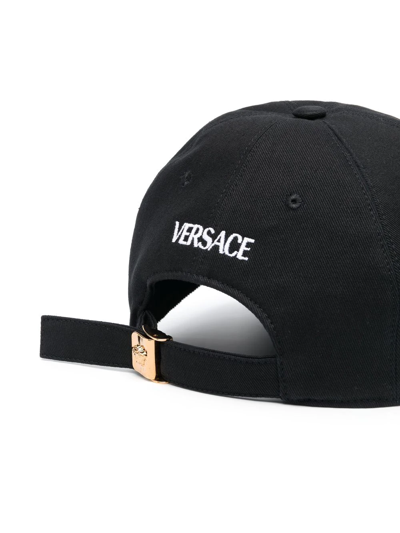 Shop Versace Embroidered Slogan Cap In 黑色