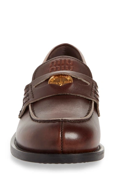 Miu Miu Logo Embossed Calf Leather Loafers In Ebano