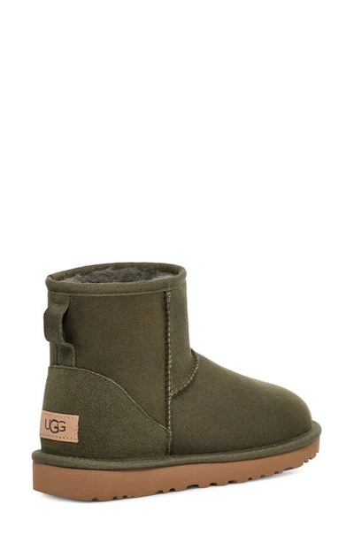 Shop Ugg Classic Mini Ii Genuine Shearling Lined Boot In Forest Night