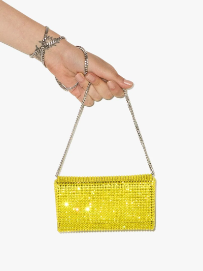 Shop Amina Muaddi Mini Paloma Crystal-embellished Clutch Bag In Yellow