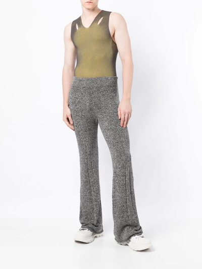 Shop Dion Lee Marl-knit Flared Trousers In Blue