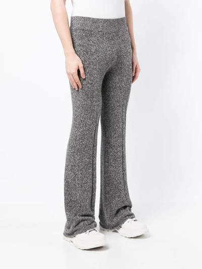 Shop Dion Lee Marl-knit Flared Trousers In Blue
