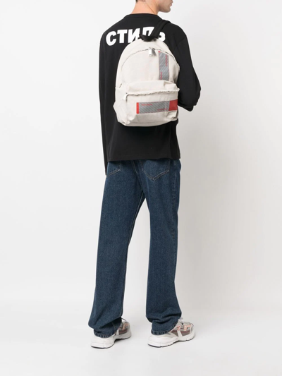 Shop Heron Preston Logo-patch Distressed Backpack In Nude