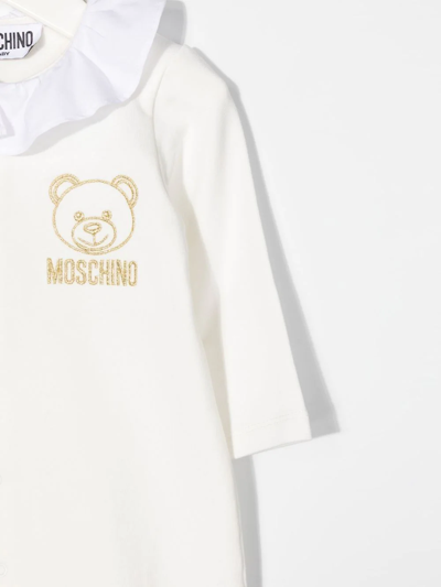 Shop Moschino Logo-embroidered Romper In White