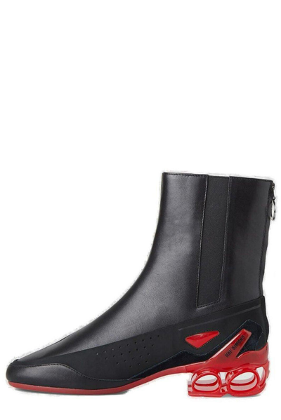 Shop Raf Simons Cycloid Perforated Detail Ankle Boots In Black