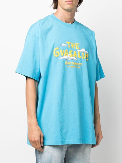 Shop Vetements Graphic Logo-print Oversized T-shirt In Azzurro